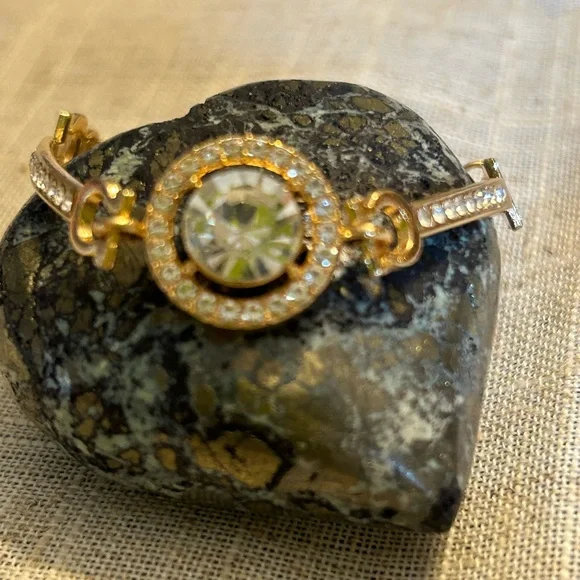 Gold and cubic zirconia focal stone with smaller cz’s each side. - Picture 1 of 9